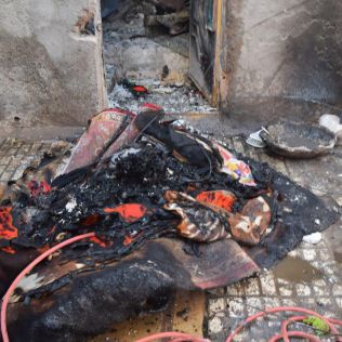 آتش نشانی نیشابور - آتش سوزی منزل مسکونی توسط آتش نشانان خاموش شد
